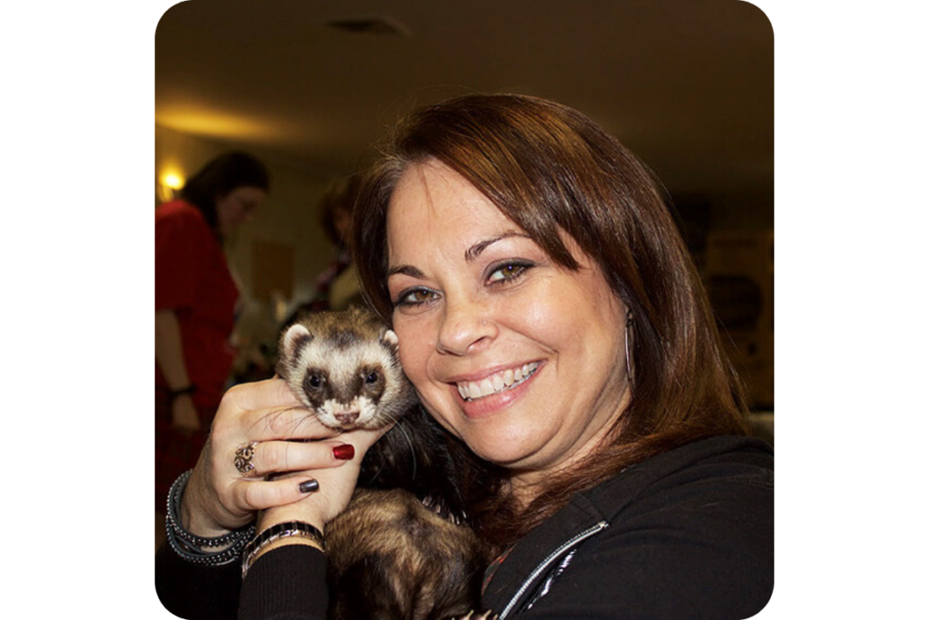 Cuddling with a ferret. 