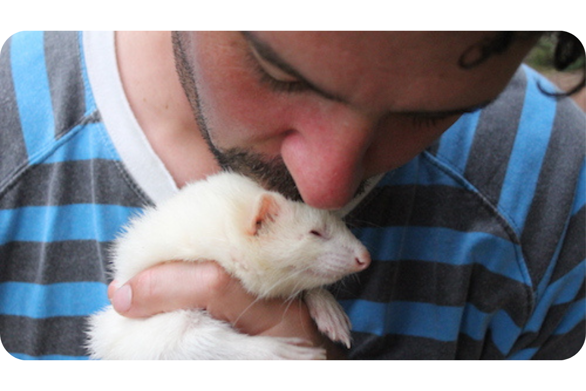 Doug kissing Yuki on the head.